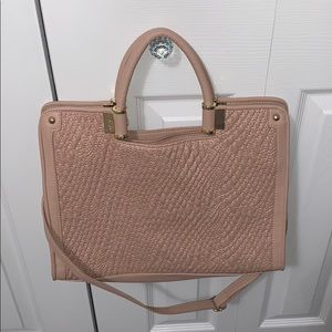 pink bag with shoulder straps